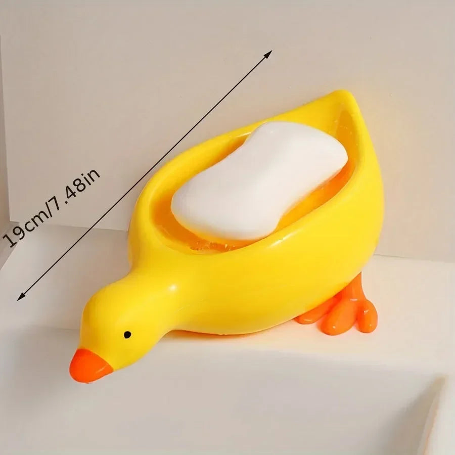 Duck-shaped self-draining soap tray.