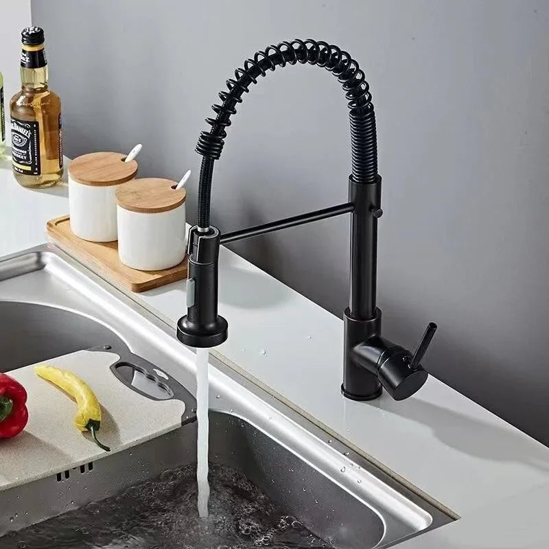 Touchless gold kitchen faucet with pull-out sprayer.