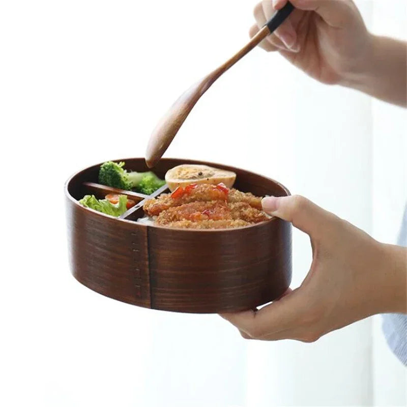 Japanese wooden bento box with 3 compartments.