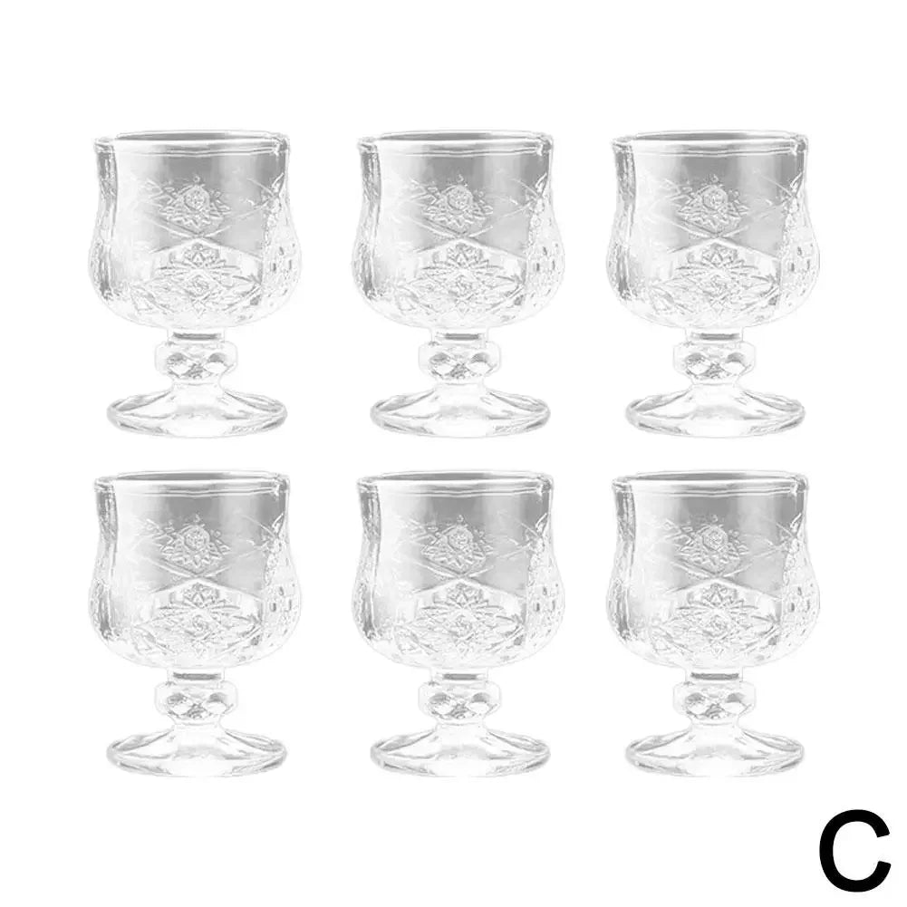Transparent glass goblet – for wine or juice. 🍷