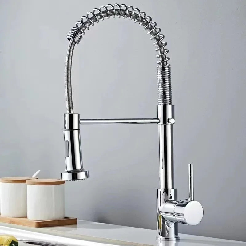 Touchless gold kitchen faucet with pull-out sprayer.