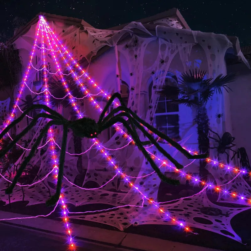 Glow-in-the-dark spider web Halloween yard decor.