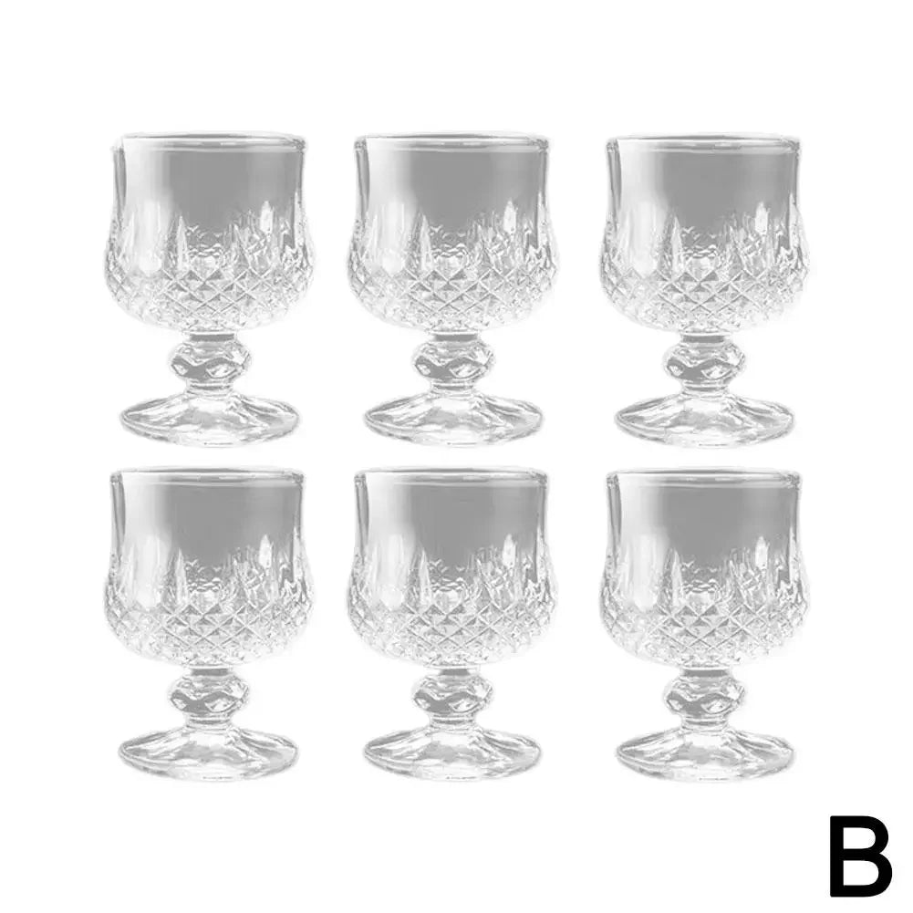 Transparent glass goblet – for wine or juice. 🍷