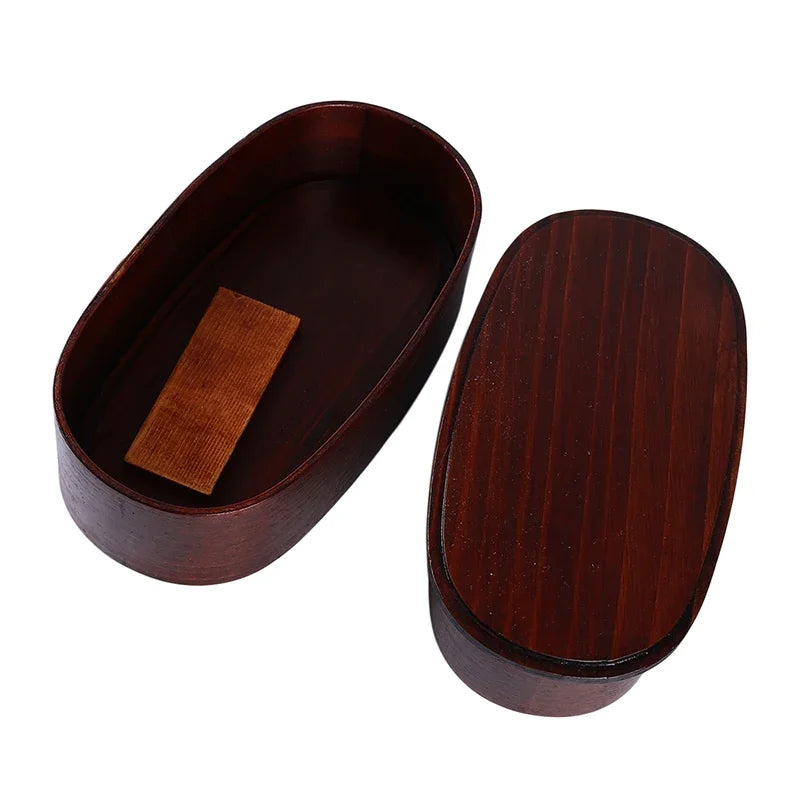 Japanese wooden bento box with 3 compartments.