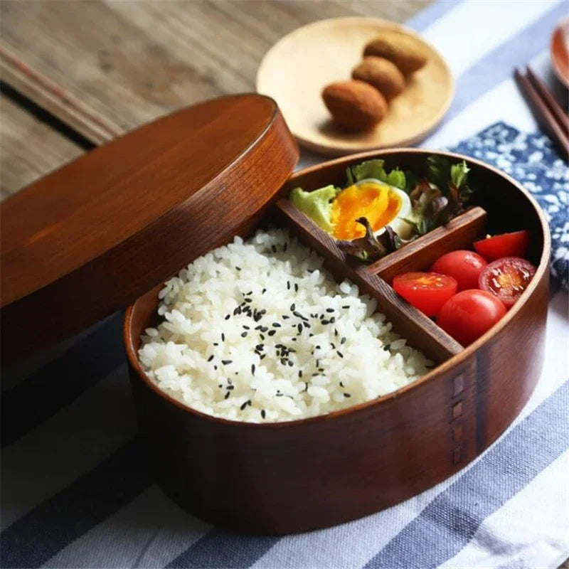 Japanese wooden bento box with 3 compartments.