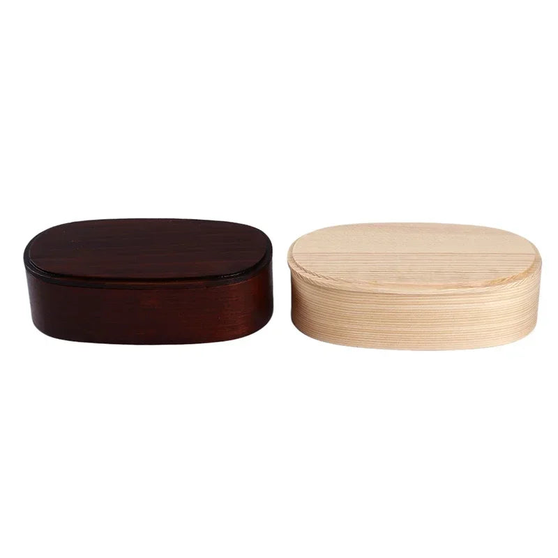 Japanese wooden bento box with 3 compartments.