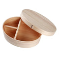 Japanese wooden bento box with 3 compartments.