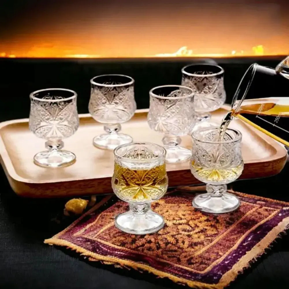 Transparent glass goblet – for wine or juice. 🍷